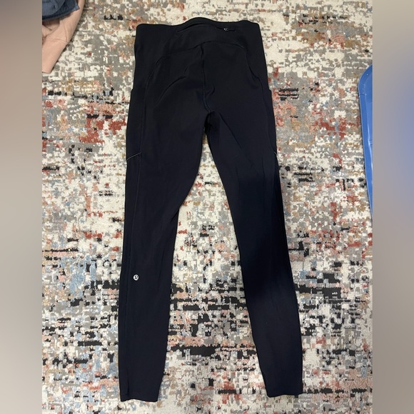 Black Lululemon Leggings with side pockets and back zipper - Picture 2 of 4